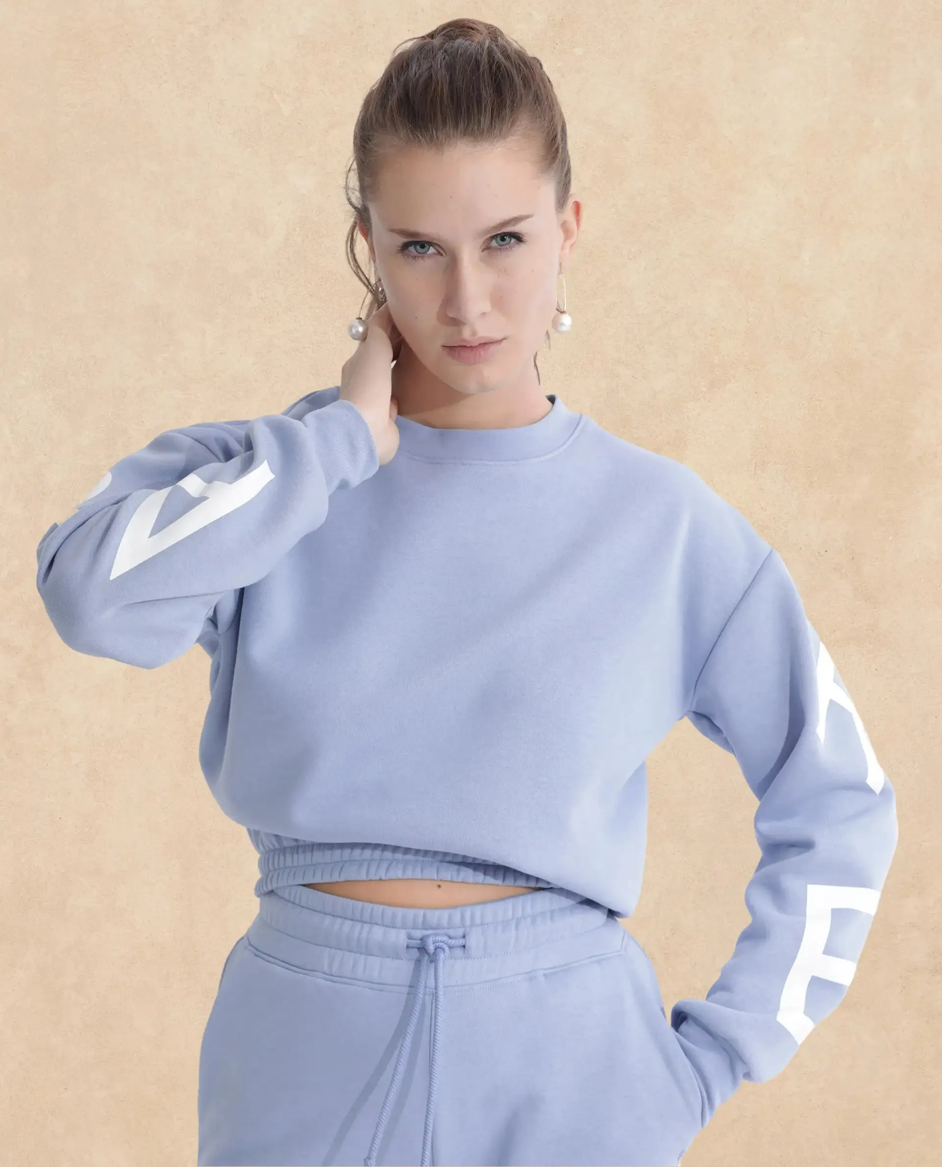 Rareism Articale Women Jonice Light Blue Poly Cotton Fabric Full Sleeves Crew Neck Regular Fit Graphic Print Cropped Sweatshirt