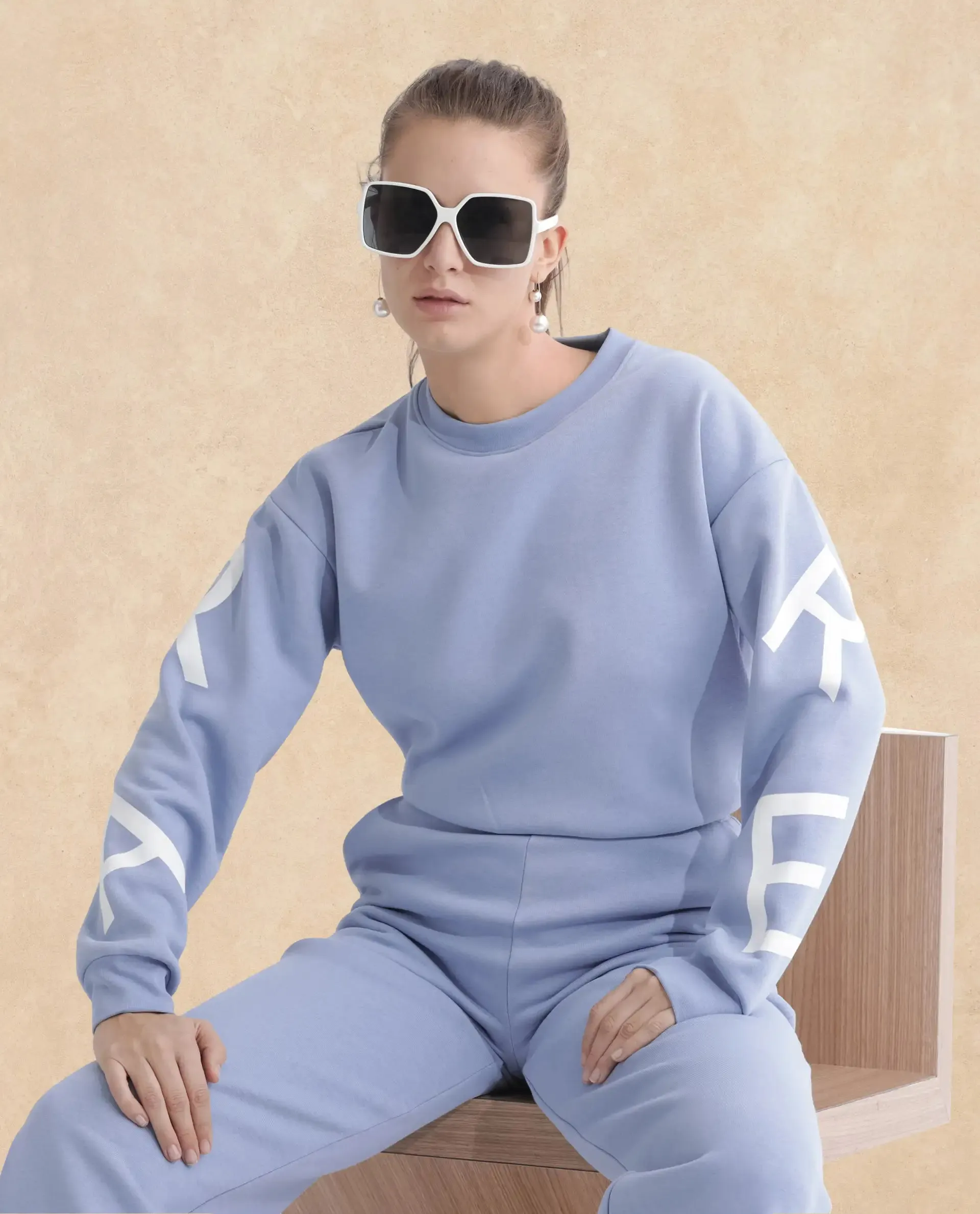 Rareism Articale Women Jonice Light Blue Poly Cotton Fabric Full Sleeves Crew Neck Regular Fit Graphic Print Cropped Sweatshirt