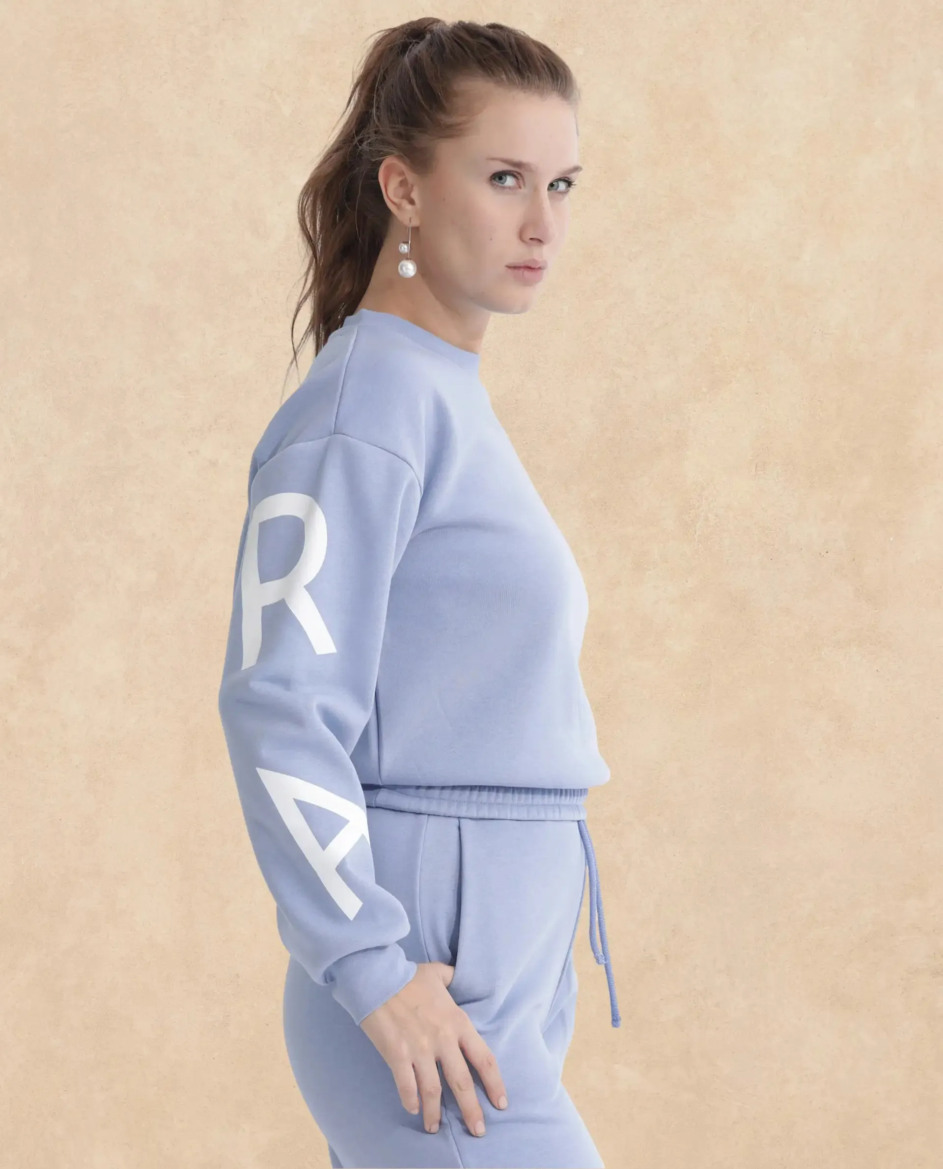 Rareism Articale Women Jonice Light Blue Poly Cotton Fabric Full Sleeves Crew Neck Regular Fit Graphic Print Cropped Sweatshirt
