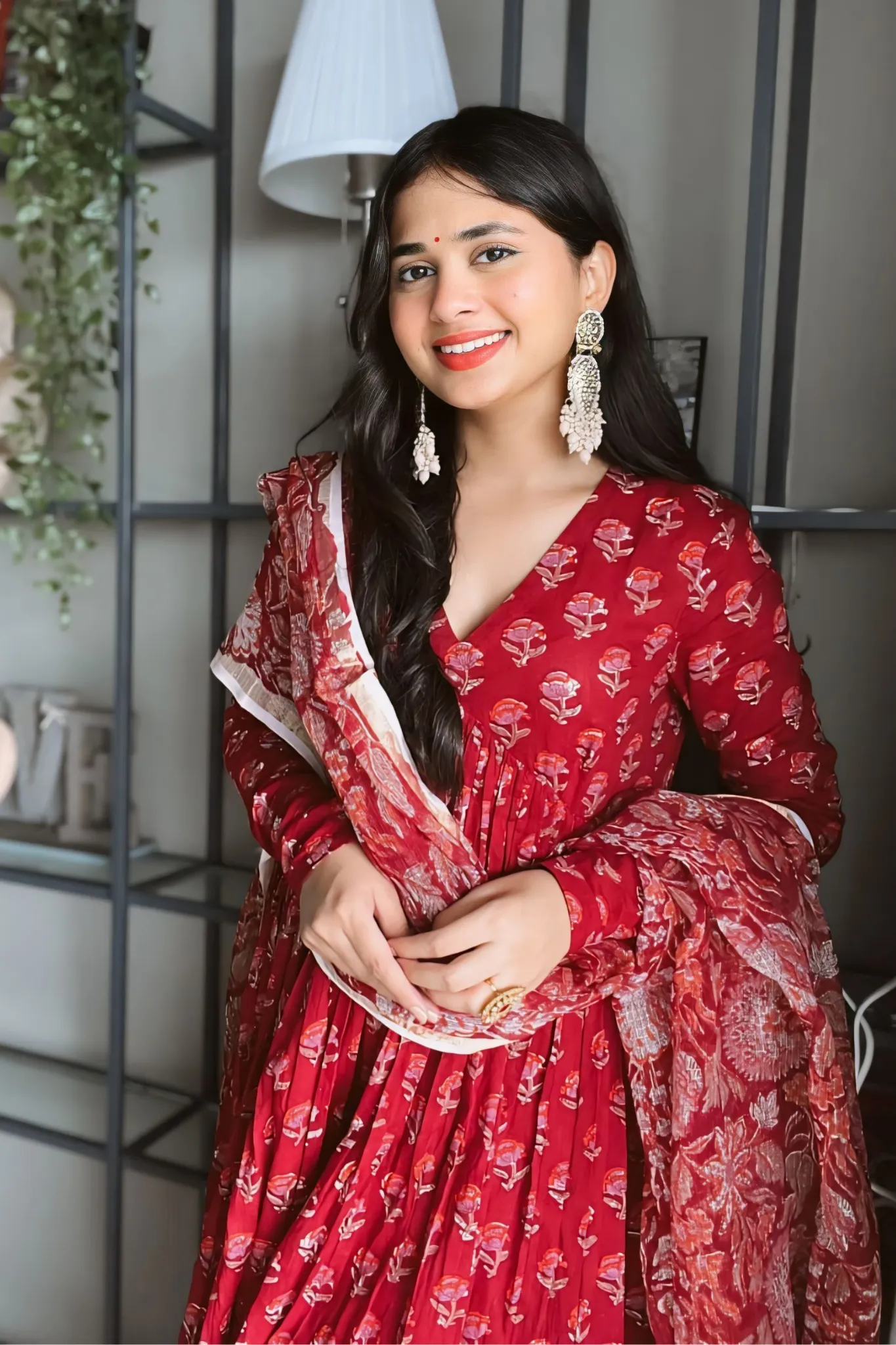 THE RED TRADITIONAL ANARKALI PAIRED WITH CHURIDAR AND DUPATTA