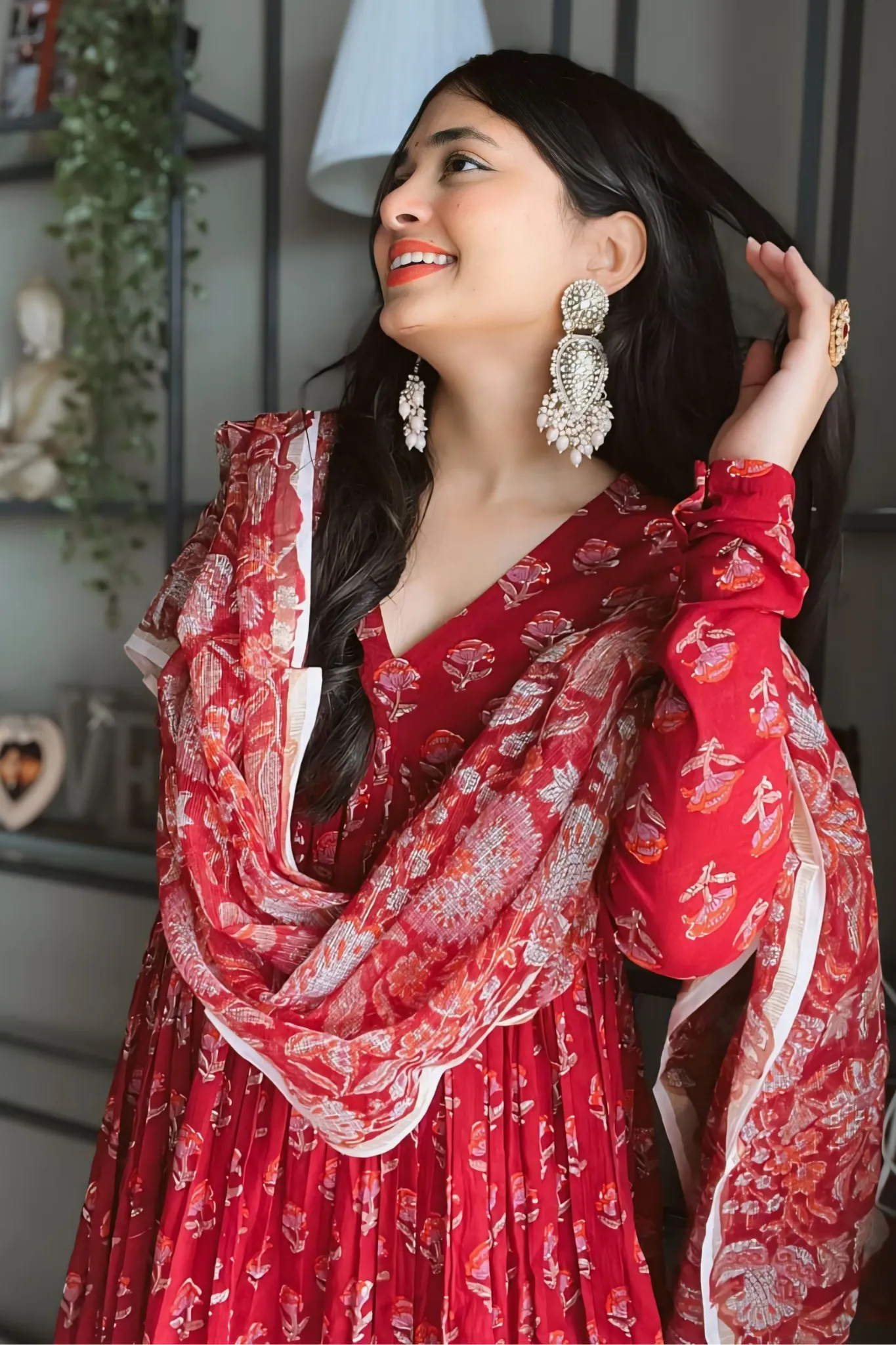 THE RED TRADITIONAL ANARKALI PAIRED WITH CHURIDAR AND DUPATTA