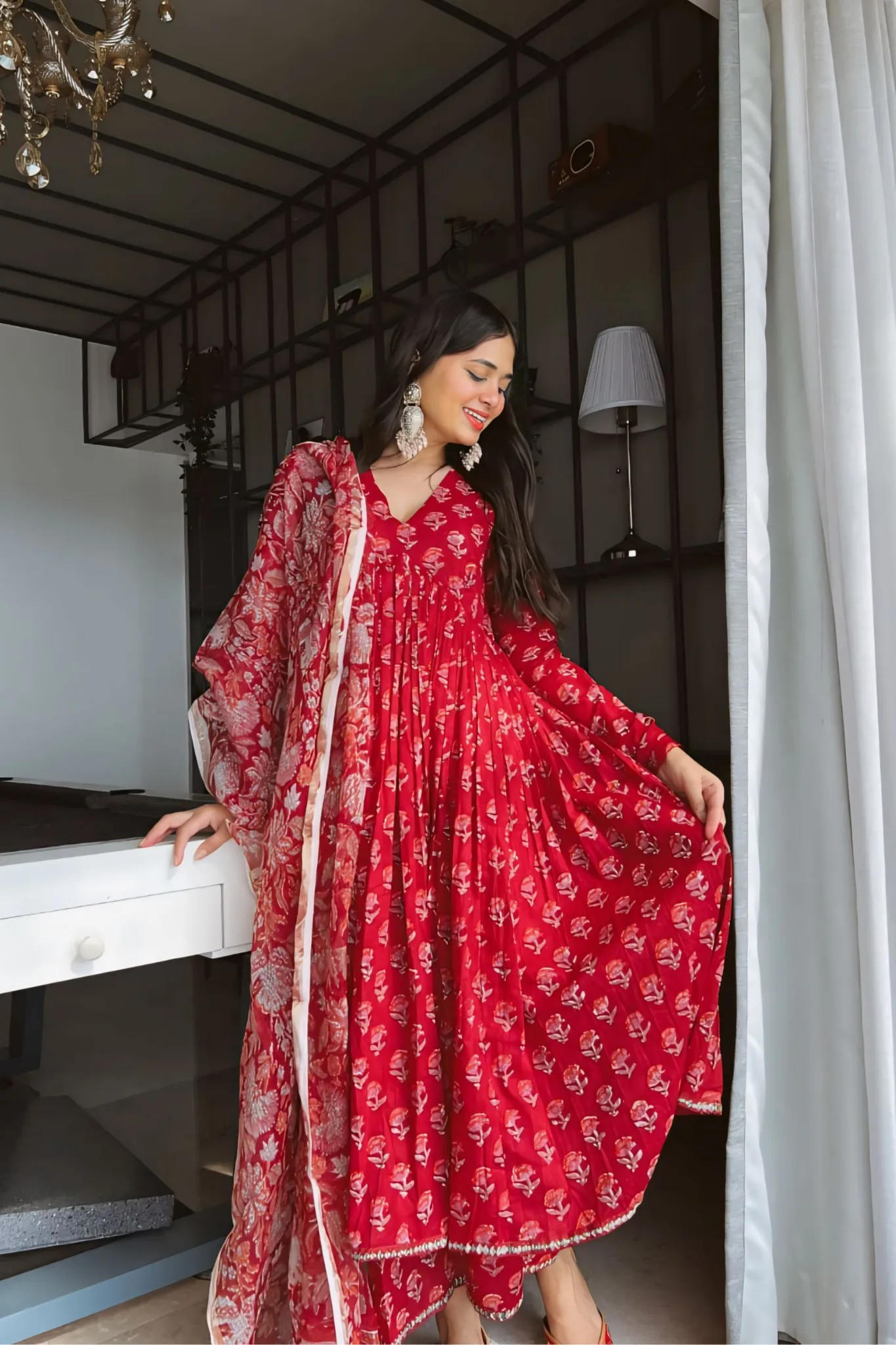 THE RED TRADITIONAL ANARKALI PAIRED WITH CHURIDAR AND DUPATTA